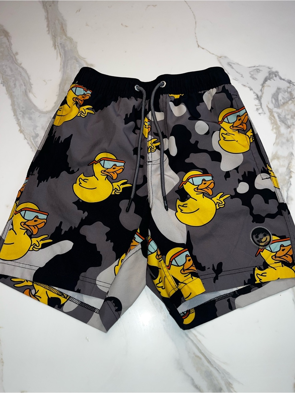 Neff men’s rubber duckie trunks euc small